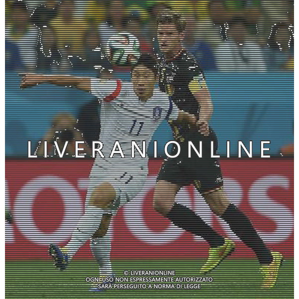 (140626) -- SAO PAULO, June 26, 2014 () -- Korea Republic\'s Lee Keun Ho (L) vies with Belgium\'s Jan Vertonghen during a Group H match between Korea Republic and Belgium of 2014 FIFA World Cup at the Arena de Sao Paulo Stadium in Sao Paulo, Brazil, on June 26, 2014. Belgium won 1-0 over Korea Republic on Thursday. Belgium and Algeria enter Round of 16 from Group H. (/Li Ga)(pcy) ©PHOTOHOT/Agenzia Aldo Liverani sas - ITALY ONLY - EDITORIAL USE ONLY