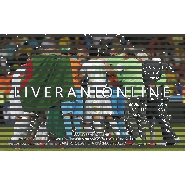 (140626) -- CURITIBA, June 26, 2014 () -- Algeria\'s players celebrate after a Group H match between Algeria and Russia of 2014 FIFA World Cup at the Arena da Baixada Stadium in Curitiba, Brazil, June 26, 2014. Algeria enters Round of 16 after the Thursday match which ended in a 1-1 draw.(/Zhou Lei) ©PHOTOHOT/Agenzia Aldo Liverani sas - ITALY ONLY - EDITORIAL USE ONLY