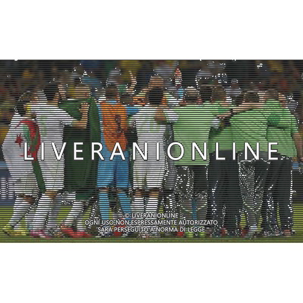 (140626) -- CURITIBA, June 26, 2014 () -- Algeria\'s players celebrate after a Group H match between Algeria and Russia of 2014 FIFA World Cup at the Arena da Baixada Stadium in Curitiba, Brazil, June 26, 2014. Algeria enters Round of 16 after the Thursday match which ended in a 1-1 draw.(/Zhou Lei) ©PHOTOHOT/Agenzia Aldo Liverani sas - ITALY ONLY - EDITORIAL USE ONLY