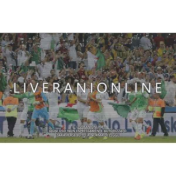 (140626) -- CURITIBA, June 26, 2014 () -- Algeria\'s players celebrate after a Group H match between Algeria and Russia of 2014 FIFA World Cup at the Arena da Baixada Stadium in Curitiba, Brazil, June 26, 2014. Algeria enters Round of 16 after the Thursday match which ended in a 1-1 draw.(/Zhou Lei) ©PHOTOHOT/Agenzia Aldo Liverani sas - ITALY ONLY - EDITORIAL USE ONLY