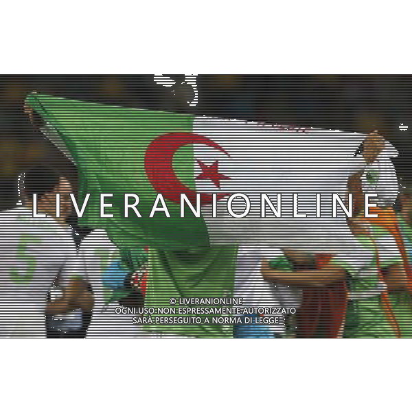 (140626) -- CURITIBA, June 26, 2014 () -- Algeria\'s players celebrate after a Group H match between Algeria and Russia of 2014 FIFA World Cup at the Arena da Baixada Stadium in Curitiba, Brazil, June 26, 2014. Algeria enters Round of 16 after the Thursday match which ended in a 1-1 draw.(/Zhou Lei) ©PHOTOHOT/Agenzia Aldo Liverani sas - ITALY ONLY - EDITORIAL USE ONLY