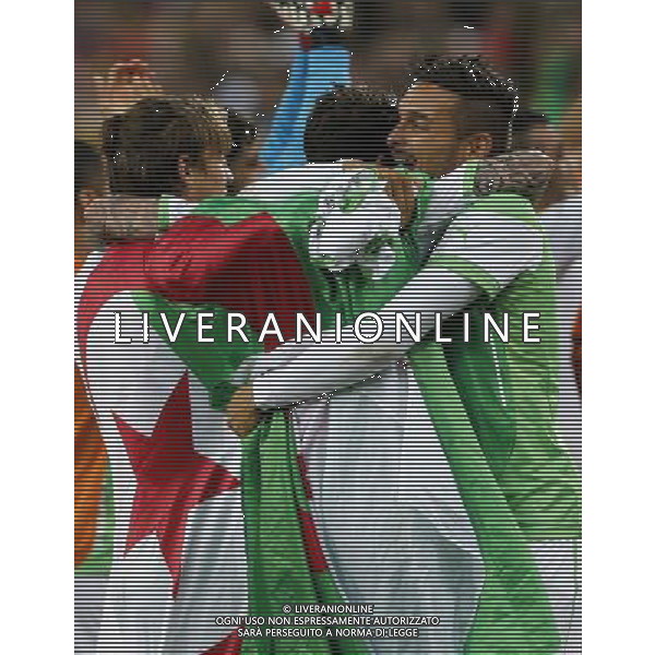 (140626) -- CURITIBA, June 26, 2014 () -- Algeria\'s players celebrate after a Group H match between Algeria and Russia of 2014 FIFA World Cup at the Arena da Baixada Stadium in Curitiba, Brazil, June 26, 2014. Algeria enters Round of 16 after the Thursday match which ended in a 1-1 draw.(/Zhou Lei) ©PHOTOHOT/Agenzia Aldo Liverani sas - ITALY ONLY - EDITORIAL USE ONLY