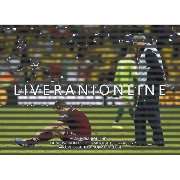 (140626) -- CURITIBA, June 26, 2014 () -- Russia\'s Aleksandr Kokorin (L) reacts after a Group H match between Algeria and Russia of 2014 FIFA World Cup at the Arena da Baixada Stadium in Curitiba, Brazil, June 26, 2014. The match ended in a 1-1 draw.Algeria enters Round of 16 after the Thursday match which ended in a 1-1 draw.(/Zhou Lei) ©PHOTOHOT/Agenzia Aldo Liverani sas - ITALY ONLY - EDITORIAL USE ONLY