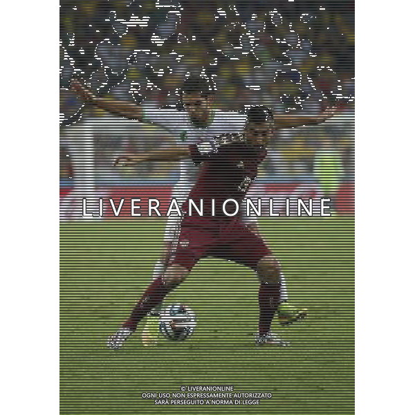 (140626) -- CURITIBA, June 26, 2014 () -- Russia\'s Alexander Samedov controls the ball during a Group H match between Algeria and Russia of 2014 FIFA World Cup at the Arena da Baixada Stadium in Curitiba, Brazil, June 26, 2014. (/Liao Yujie) ©PHOTOHOT/Agenzia Aldo Liverani sas - ITALY ONLY - EDITORIAL USE ONLY