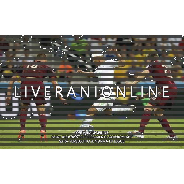 (140626) -- CURITIBA, June 26, 2014 () -- Algeria\'s Sofiane Feghouli (C) passes the ball during a Group H match between Algeria and Russia of 2014 FIFA World Cup at the Arena da Baixada Stadium in Curitiba, Brazil, June 26, 2014. (/Zhou Lei) ©PHOTOHOT/Agenzia Aldo Liverani sas - ITALY ONLY - EDITORIAL USE ONLY