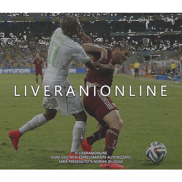 (140626) -- CURITIBA, June 26, 2014 () -- Algeria\'s Yasine Brahimi vies with Russia\'s Igor Denisov during a Group H match between Algeria and Russia of 2014 FIFA World Cup at the Arena da Baixada Stadium in Curitiba, Brazil, June 26, 2014. (/Zhou Lei) ©PHOTOHOT/Agenzia Aldo Liverani sas - ITALY ONLY - EDITORIAL USE ONLY