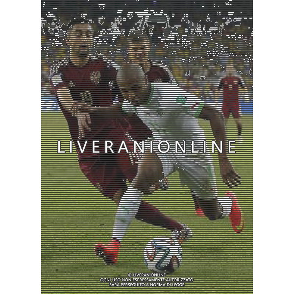 (140626) -- CURITIBA, June 26, 2014 () -- Algeria\'s Yasine Brahimi vies with Russia\'s Alexander Samedov during a Group H match between Algeria and Russia of 2014 FIFA World Cup at the Arena da Baixada Stadium in Curitiba, Brazil, June 26, 2014. (/Zhou Lei) ©PHOTOHOT/Agenzia Aldo Liverani sas - ITALY ONLY - EDITORIAL USE ONLY