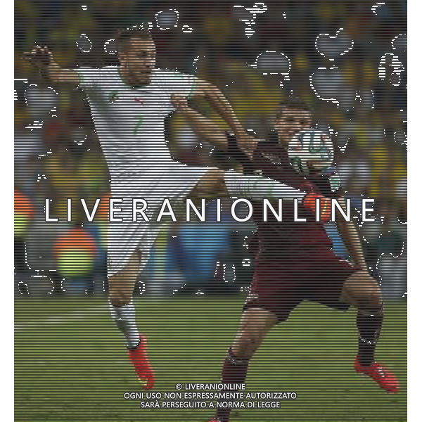 (140626) -- CURITIBA, June 26, 2014 () -- Algeria\'s Hassan Yebda vies with Russia\'s Igor Denisov during a Group H match between Algeria and Russia of 2014 FIFA World Cup at the Arena da Baixada Stadium in Curitiba, Brazil, June 26, 2014. (/Liao Yujie) ©PHOTOHOT/Agenzia Aldo Liverani sas - ITALY ONLY - EDITORIAL USE ONLY