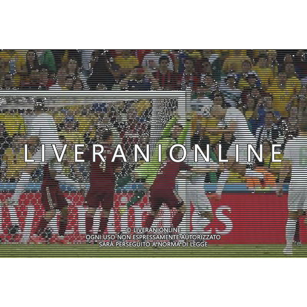 (140626) -- CURITIBA, June 26, 2014 () -- Algeria\'s Islam Slimani (2nd R) shoots a header during a Group H match between Algeria and Russia of 2014 FIFA World Cup at the Arena da Baixada Stadium in Curitiba, Brazil, June 26, 2014. (/Liao Yujie) ©PHOTOHOT/Agenzia Aldo Liverani sas - ITALY ONLY - EDITORIAL USE ONLY