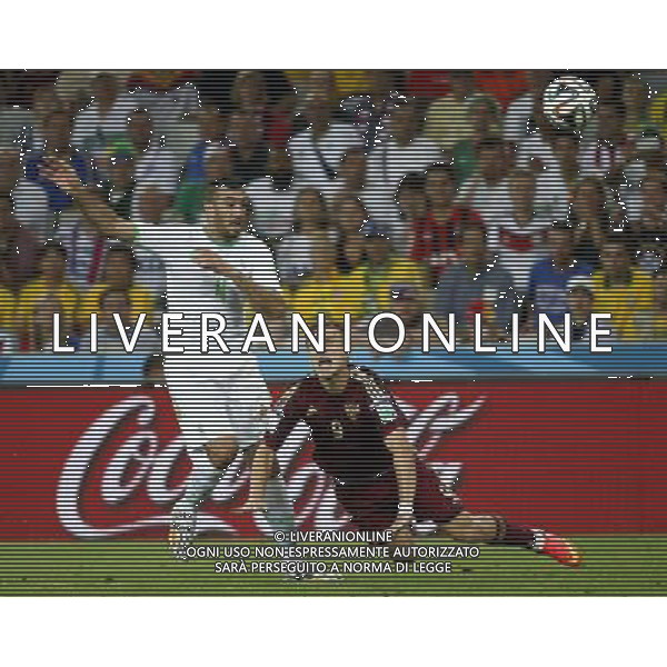 (140626) -- CURITIBA, June 26, 2014 () -- Algeria\'s Essaid Belkalem vies with Russia\'s Aleksandr Kokorin during a Group H match between Algeria and Russia of 2014 FIFA World Cup at the Arena da Baixada Stadium in Curitiba, Brazil, June 26, 2014. (/Liao Yujie) ©PHOTOHOT/Agenzia Aldo Liverani sas - ITALY ONLY - EDITORIAL USE ONLY