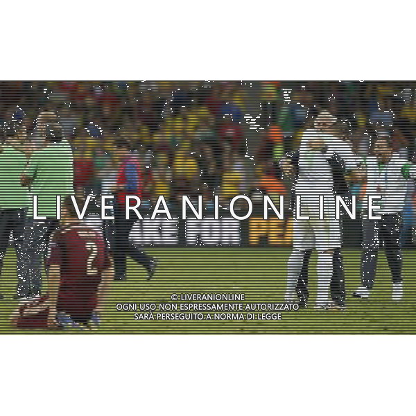 (140626) -- CURITIBA, June 26, 2014 () -- Algeria\'s coach Vahid Halilhodzic hugs Essaid Belkalem after a Group H match between Algeria and Russia of 2014 FIFA World Cup at the Arena da Baixada Stadium in Curitiba, Brazil, June 26, 2014. The match ended in a 1-1 draw.(/Zhou Lei) ©PHOTOHOT/Agenzia Aldo Liverani sas - ITALY ONLY - EDITORIAL USE ONLY