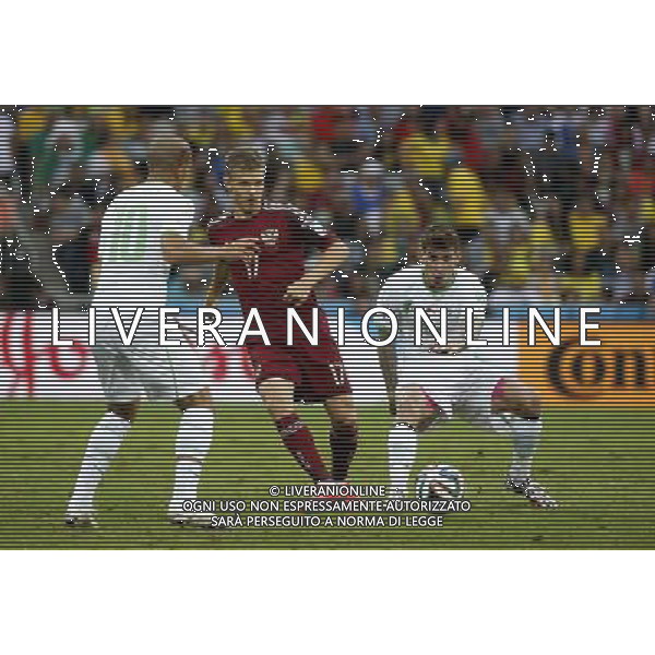 (140626) -- CURITIBA, June 26, 2014 () -- Russia\'s Oleg Shatov passes the ball during a Group H match between Algeria and Russia of 2014 FIFA World Cup at the Arena da Baixada Stadium in Curitiba, Brazil, June 26, 2014. (/Liao Yujie) ©PHOTOHOT/Agenzia Aldo Liverani sas - ITALY ONLY - EDITORIAL USE ONLY