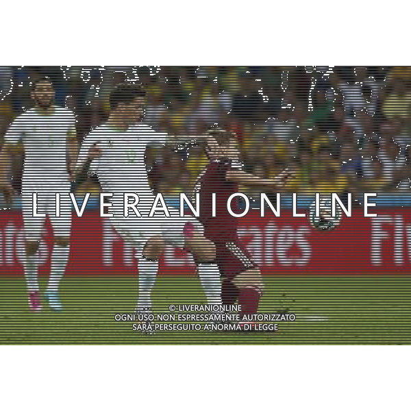 (140626) -- CURITIBA, June 26, 2014 () -- Algeria\'s Carl Medjani vies with Russia\'s Aleksandr Kokorin during a Group H match between Algeria and Russia of 2014 FIFA World Cup at the Arena da Baixada Stadium in Curitiba, Brazil, June 26, 2014. (/Liao Yujie) ©PHOTOHOT/Agenzia Aldo Liverani sas - ITALY ONLY - EDITORIAL USE ONLY