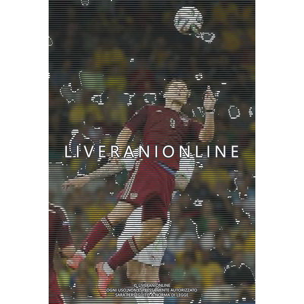 (140626) -- CURITIBA, June 26, 2014 () -- Algeria\'s Carl Medjani competes for a header with Russia\'s Aleksandr Kokorin during a Group H match between Algeria and Russia of 2014 FIFA World Cup at the Arena da Baixada Stadium in Curitiba, Brazil, June 26, 2014. (/Liao Yujie) ©PHOTOHOT/Agenzia Aldo Liverani sas - ITALY ONLY - EDITORIAL USE ONLY