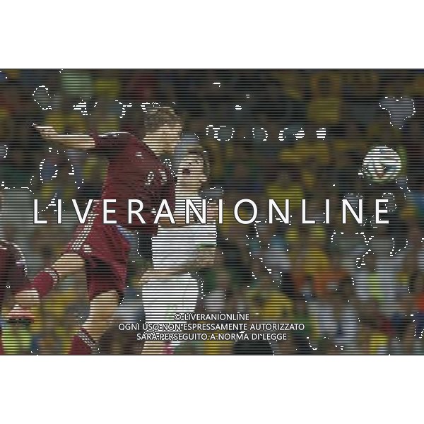 (140626) -- CURITIBA, June 26, 2014 () -- Algeria\'s Carl Medjani competes for a header with Russia\'s Aleksandr Kokorin during a Group H match between Algeria and Russia of 2014 FIFA World Cup at the Arena da Baixada Stadium in Curitiba, Brazil, June 26, 2014. (/Liao Yujie) ©PHOTOHOT/Agenzia Aldo Liverani sas - ITALY ONLY - EDITORIAL USE ONLY