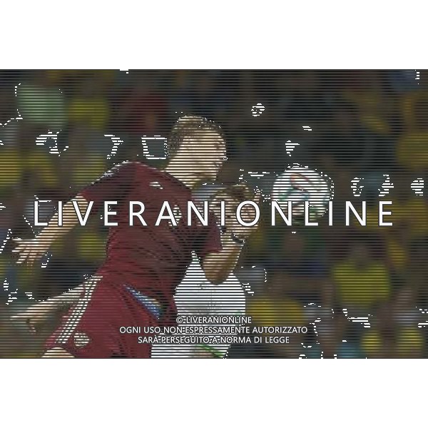 (140626) -- CURITIBA, June 26, 2014 () -- Algeria\'s Carl Medjani competes for a header with Russia\'s Aleksandr Kokorin during a Group H match between Algeria and Russia of 2014 FIFA World Cup at the Arena da Baixada Stadium in Curitiba, Brazil, June 26, 2014. (/Liao Yujie) ©PHOTOHOT/Agenzia Aldo Liverani sas - ITALY ONLY - EDITORIAL USE ONLY