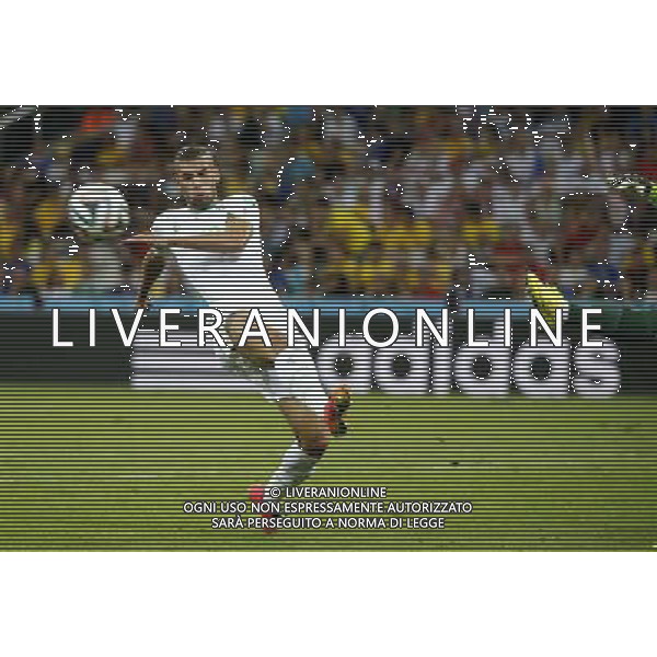 (140626) -- CURITIBA, June 26, 2014 () -- Algeria\'s Islam Slimani vies for the ball during a Group H match between Algeria and Russia of 2014 FIFA World Cup at the Arena da Baixada Stadium in Curitiba, Brazil, June 26, 2014. (/Liao Yujie) ©PHOTOHOT/Agenzia Aldo Liverani sas - ITALY ONLY - EDITORIAL USE ONLY