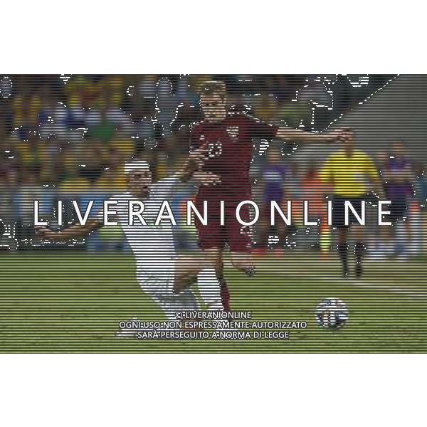 (140626) -- CURITIBA, June 26, 2014 () -- Algeria\'s Sofiane Feghouli vies with Russia\'s Dmitriy Kombarov during a Group H match between Algeria and Russia of 2014 FIFA World Cup at the Arena da Baixada Stadium in Curitiba, Brazil, June 26, 2014. (/Zhou Lei) ©PHOTOHOT/Agenzia Aldo Liverani sas - ITALY ONLY - EDITORIAL USE ONLY