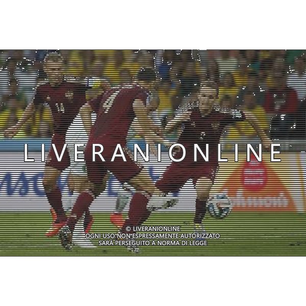 (140626) -- CURITIBA, June 26, 2014 () -- Russia\'s Aleksey Kozlov (1st R) vies for the ball during a Group H match between Algeria and Russia of 2014 FIFA World Cup at the Arena da Baixada Stadium in Curitiba, Brazil, June 26, 2014. (/Liao Yujie) ©PHOTOHOT/Agenzia Aldo Liverani sas - ITALY ONLY - EDITORIAL USE ONLY