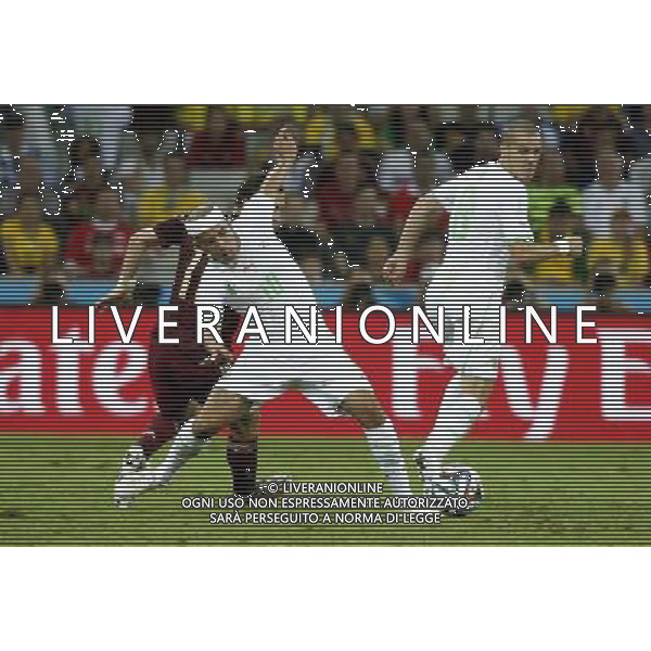 (140626) -- CURITIBA, June 26, 2014 () -- Algeria\'s Sofiane Feghouli (C) vies for the ball during a Group H match between Algeria and Russia of 2014 FIFA World Cup at the Arena da Baixada Stadium in Curitiba, Brazil, June 26, 2014. (/Liao Yujie) ©PHOTOHOT/Agenzia Aldo Liverani sas - ITALY ONLY - EDITORIAL USE ONLY