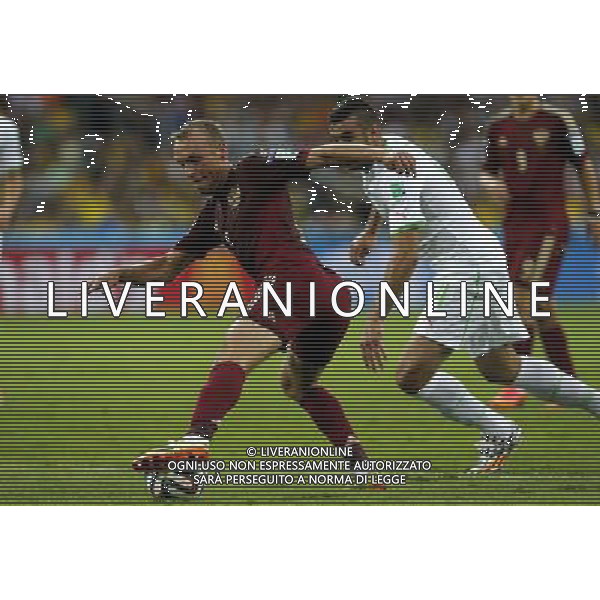 (140626) -- CURITIBA, June 26, 2014 () -- Russia\'s Denis Glushakov controls the ball during a Group H match between Algeria and Russia of 2014 FIFA World Cup at the Arena da Baixada Stadium in Curitiba, Brazil, June 26, 2014. (/Zhou Lei) ©PHOTOHOT/Agenzia Aldo Liverani sas - ITALY ONLY - EDITORIAL USE ONLY