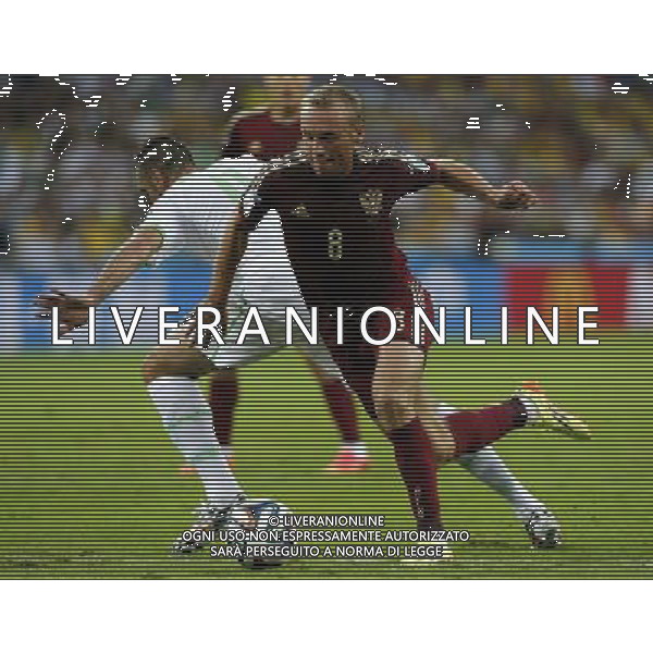 (140626) -- CURITIBA, June 26, 2014 () -- Russia\'s Denis Glushakov runs with the ball during a Group H match between Algeria and Russia of 2014 FIFA World Cup at the Arena da Baixada Stadium in Curitiba, Brazil, June 26, 2014. (/Zhou Lei) ©PHOTOHOT/Agenzia Aldo Liverani sas - ITALY ONLY - EDITORIAL USE ONLY