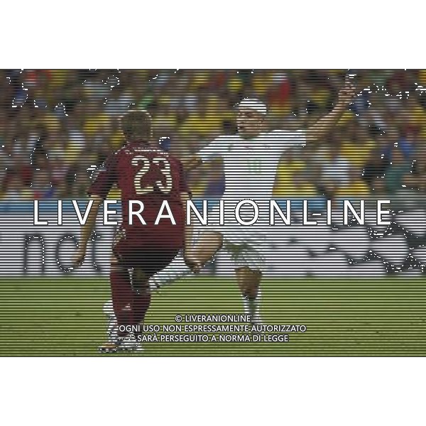 (140626) -- CURITIBA, June 26, 2014 () -- Algeria\'s Sofiane Feghouli vies with Russia\'s Dmitriy Kombarov during a Group H match between Algeria and Russia of 2014 FIFA World Cup at the Arena da Baixada Stadium in Curitiba, Brazil, June 26, 2014. (/Liao Yujie) ©PHOTOHOT/Agenzia Aldo Liverani sas - ITALY ONLY - EDITORIAL USE ONLY