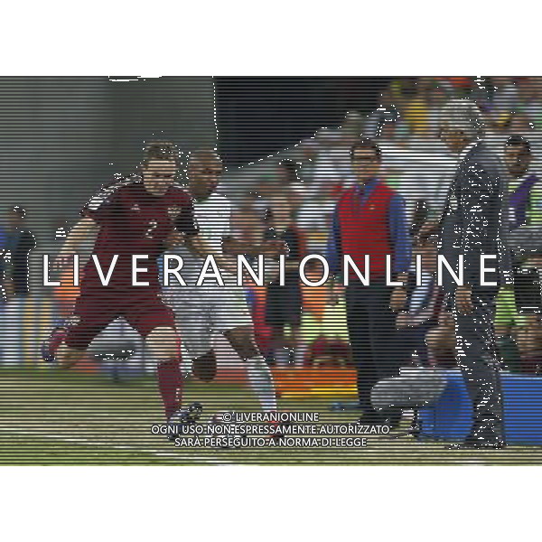 (140626) -- CURITIBA, June 26, 2014 () -- Algeria\'s Yasine Brahimi vies with Russia\'s Aleksey Kozlov during a Group H match between Algeria and Russia of 2014 FIFA World Cup at the Arena da Baixada Stadium in Curitiba, Brazil, June 26, 2014. (/Zhou Lei) ©PHOTOHOT/Agenzia Aldo Liverani sas - ITALY ONLY - EDITORIAL USE ONLY