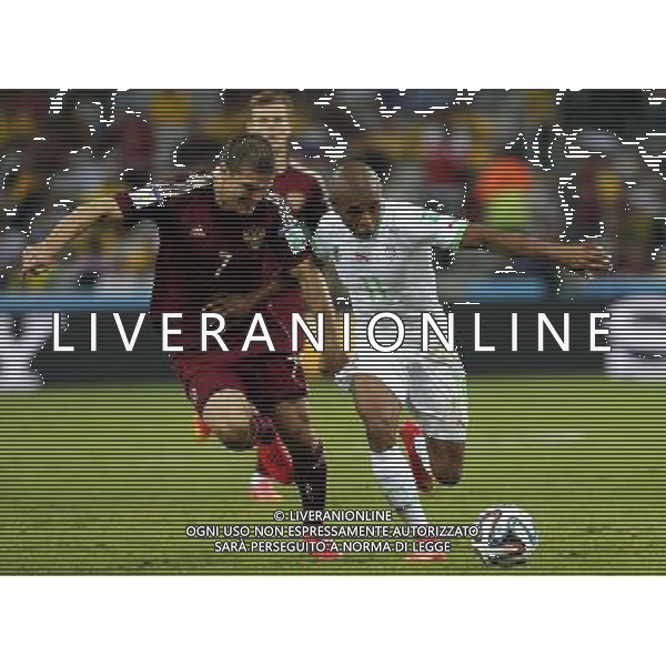 (140626) -- CURITIBA, June 26, 2014 () -- Algeria\'s Yasine Brahimi vies with Russia\'s Igor Denisov during a Group H match between Algeria and Russia of 2014 FIFA World Cup at the Arena da Baixada Stadium in Curitiba, Brazil, June 26, 2014. (/Zhou Lei) ©PHOTOHOT/Agenzia Aldo Liverani sas - ITALY ONLY - EDITORIAL USE ONLY