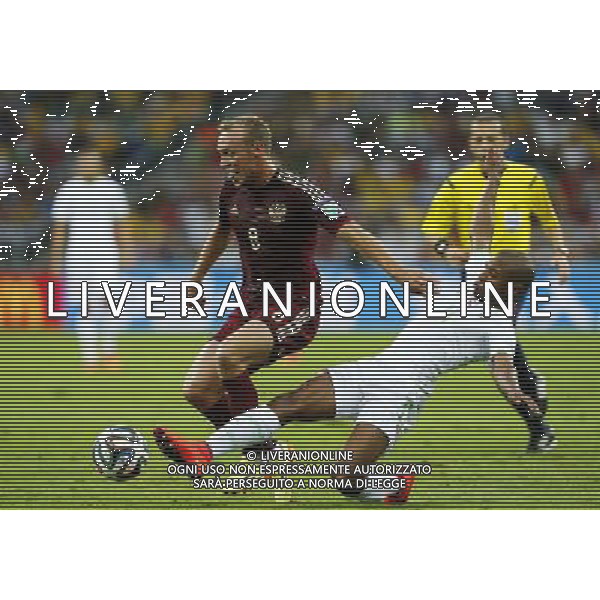 (140626) -- CURITIBA, June 26, 2014 () -- Algeria\'s Yasine Brahimi vies with Russia\'s Denis Glushakov during a Group H match between Algeria and Russia of 2014 FIFA World Cup at the Arena da Baixada Stadium in Curitiba, Brazil, June 26, 2014. (/Zhou Lei) ©PHOTOHOT/Agenzia Aldo Liverani sas - ITALY ONLY - EDITORIAL USE ONLY