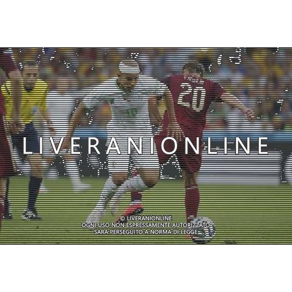 (140626) -- CURITIBA, June 26, 2014 () -- Algeria\'s Sofiane Feghouli vies with Russia\'s Victor Fayzulin during a Group H match between Algeria and Russia of 2014 FIFA World Cup at the Arena da Baixada Stadium in Curitiba, Brazil, June 26, 2014. (/Liao Yujie) ©PHOTOHOT/Agenzia Aldo Liverani sas - ITALY ONLY - EDITORIAL USE ONLY