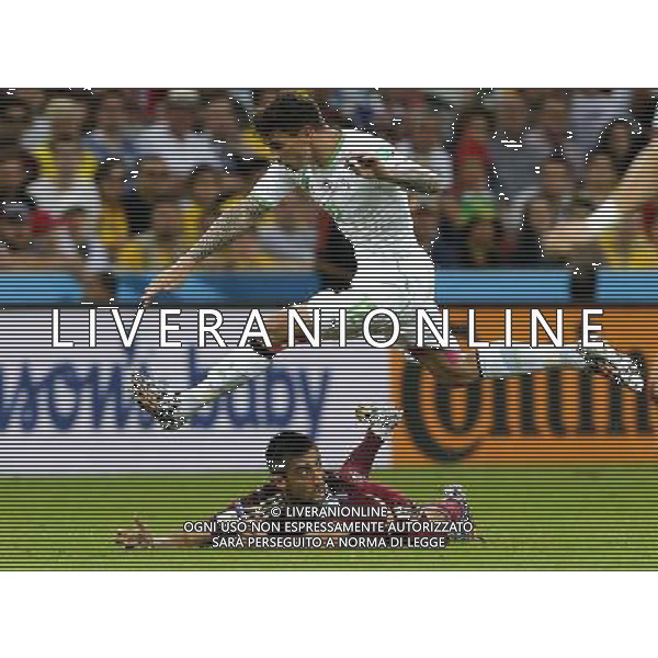 (140626) -- CURITIBA, June 26, 2014 () -- Algeria\'s Carl Medjani vies with Russia\'s Alexander Samedov during a Group H match between Algeria and Russia of 2014 FIFA World Cup at the Arena da Baixada Stadium in Curitiba, Brazil, June 26, 2014. (/Zhou Lei) ©PHOTOHOT/Agenzia Aldo Liverani sas - ITALY ONLY - EDITORIAL USE ONLY