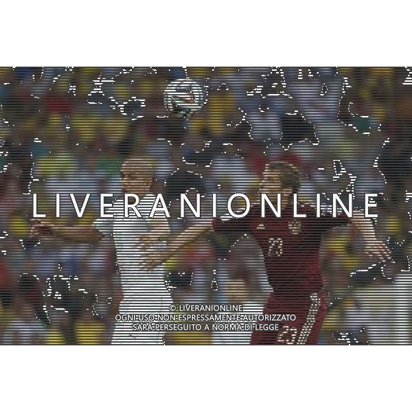 (140626) -- CURITIBA, June 26, 2014 () -- Algeria\'s Sofiane Feghouli vies with Russia\'s Dmitriy Kombarov during a Group H match between Algeria and Russia of 2014 FIFA World Cup at the Arena da Baixada Stadium in Curitiba, Brazil, June 26, 2014. (/Liao Yujie) ©PHOTOHOT/Agenzia Aldo Liverani sas - ITALY ONLY - EDITORIAL USE ONLY