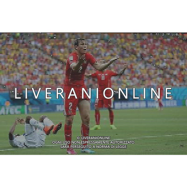 (140625) -- MANAUS, June 25, 2014 () -- Switzerland\'s Stephan Lichtsteiner (front) reacts during a Group E match between Honduras and Switzerland of 2014 FIFA World Cup at the Arena Amazonia Stadium in Manaus, Brazil, on June 25, 2014. Switzerland won 3-0 over Honduras on Wednesday. (/Li Ming)(pcy) ©PHOTOSHOT/Agenzia Aldo Liverani sas - ITALY ONLY - EDITORIAL USE ONLY