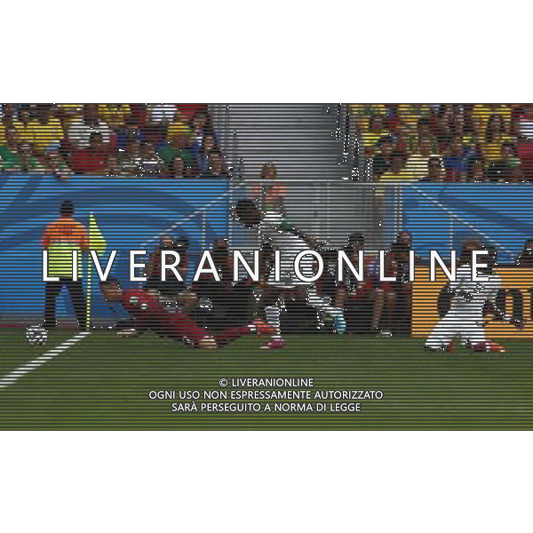 (140626) -- BRASILIA, June 26, 2014 () -- Portugal\'s Cristiano Ronaldo (L) falls down during a Group G match between Portugal and Ghana of 2014 FIFA World Cup at the Estadio Nacional Stadium in Brasilia, Brazil, June 26, 2014. (/Liu Bin) ©PHOTOHOT/Agenzia Aldo Liverani sas - ITALY ONLY - EDITORIAL USE ONLY