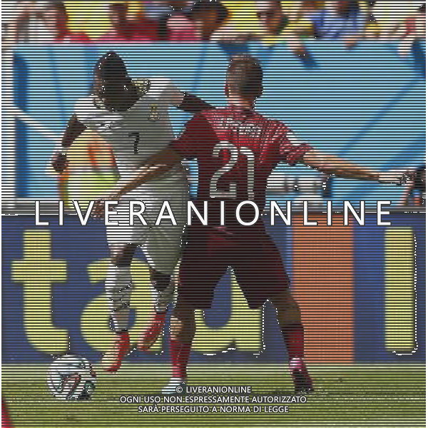 (140626) -- BRASILIA, June 26, 2014 () -- Portugal\'s Joao Pereira vies with Ghana\'s Christian Atsu during a Group G match between Portugal and Ghana of 2014 FIFA World Cup at the Estadio Nacional Stadium in Brasilia, Brazil, June 26, 2014. (/Liu Bin) ©PHOTOHOT/Agenzia Aldo Liverani sas - ITALY ONLY - EDITORIAL USE ONLY