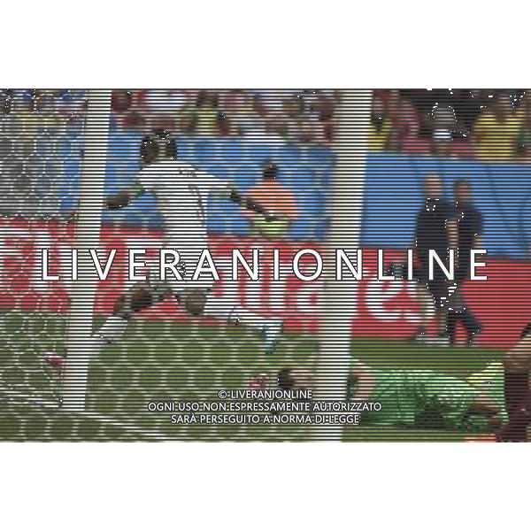 (140626) -- BRASILIA, June 26, 2014 () -- Ghana\'s Asamoah Gyan (L) reacts after scoring a goal for Ghana during a Group G match between Portugal and Ghana of 2014 FIFA World Cup at the Estadio Nacional Stadium in Brasilia, Brazil, June 26, 2014. (/Qi Heng)(xzj) ©PHOTOHOT/Agenzia Aldo Liverani sas - ITALY ONLY - EDITORIAL USE ONLY