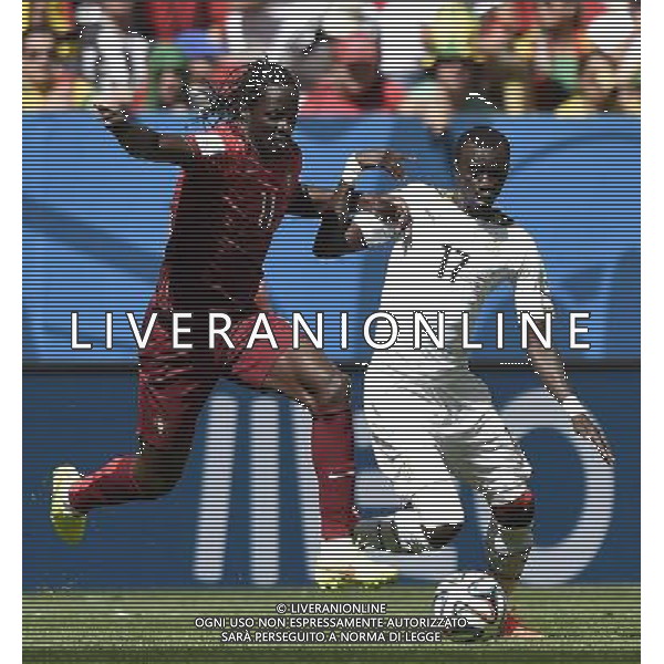 (140626) -- BRASILIA, June 26, 2014 () -- Portugal\'s Eder (L) vies with Ghana\'s Mohammed Rabiu during a Group G match between Portugal and Ghana of 2014 FIFA World Cup at the Estadio Nacional Stadium in Brasilia, Brazil, June 26, 2014. (/Qi Heng)(xzj) ©PHOTOHOT/Agenzia Aldo Liverani sas - ITALY ONLY - EDITORIAL USE ONLY