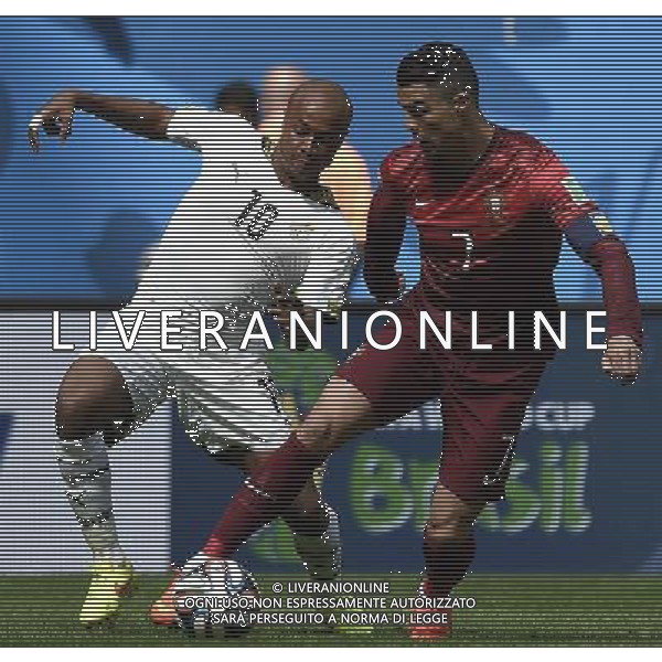 (140626) -- BRASILIA, June 26, 2014 () -- Portugal\'s Cristiano Ronaldo (R) vies with Ghana\'s Andre Ayew during a Group G match between Portugal and Ghana of 2014 FIFA World Cup at the Estadio Nacional Stadium in Brasilia, Brazil, June 26, 2014. (/Qi Heng)(xzj) ©PHOTOHOT/Agenzia Aldo Liverani sas - ITALY ONLY - EDITORIAL USE ONLY