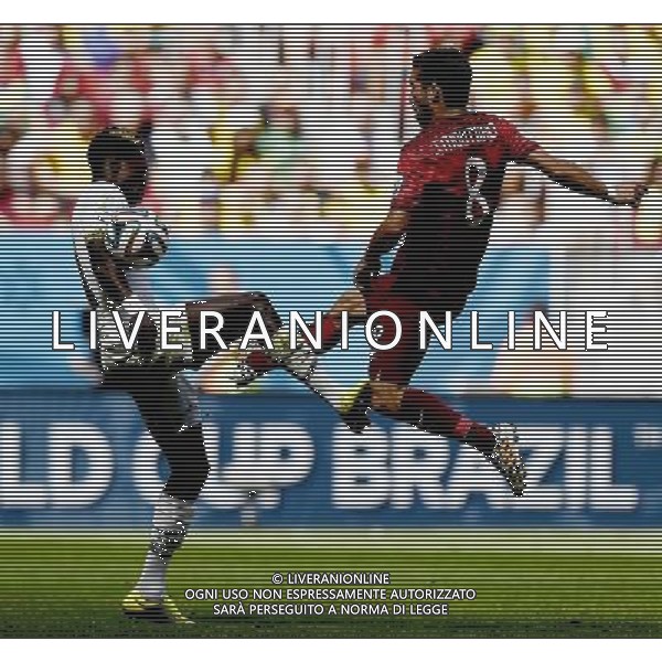 (140626) -- BRASILIA, June 26, 2014 () -- Portugal\'s Joao Moutinho (R) competes during a Group G match between Portugal and Ghana of 2014 FIFA World Cup at the Estadio Nacional Stadium in Brasilia, Brazil, June 26, 2014. (/Qi Heng)(xzj) ©PHOTOHOT/Agenzia Aldo Liverani sas - ITALY ONLY - EDITORIAL USE ONLY