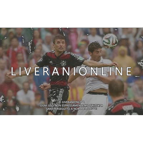 (140626) -- RECIFE, June 26, 2014 () -- Germany\'s Thomas Muller (L) vies with Omar Gonzalez of the U.S. during a Group G match between the U.S. and Germany of 2014 FIFA World Cup at the Arena Pernambuco Stadium in Recife, Brazil, on June 26, 2014.(/Guo Yong)(pcy) ©PHOTOHOT/Agenzia Aldo Liverani sas - ITALY ONLY - EDITORIAL USE ONLY