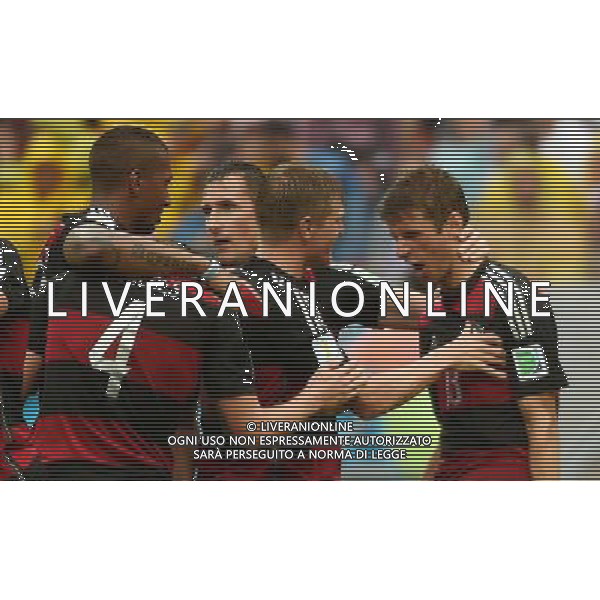 (140626) -- RECIFE, June 26, 2014 () -- Germany\'s Jerome Boateng, Benedikt Howedes, Miroslav Klose and Bastian Schweinsteiger (from 1st L to 4th L)celebrate for Thomas Muller\'s goal (1st R) during a Group G match between the U.S. and Germany of 2014 FIFA World Cup at the Arena Pernambuco Stadium in Recife, Brazil, on June 26, 2014.(/Guo Yong)(pcy) ©PHOTOHOT/Agenzia Aldo Liverani sas - ITALY ONLY - EDITORIAL USE ONLY