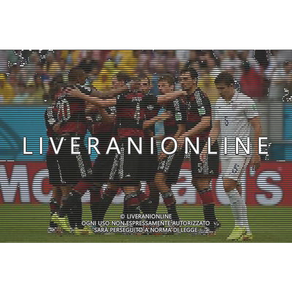 (140626) -- RECIFE, June 26, 2014 () -- Germany\'s Thomas Muller (3rd R) celebrates for scoring a goal with his teammates during a Group G match between the U.S. and Germany of 2014 FIFA World Cup at the Arena Pernambuco Stadium in Recife, Brazil, on June 26, 2014.(/Guo Yong)(pcy) ©PHOTOHOT/Agenzia Aldo Liverani sas - ITALY ONLY - EDITORIAL USE ONLY