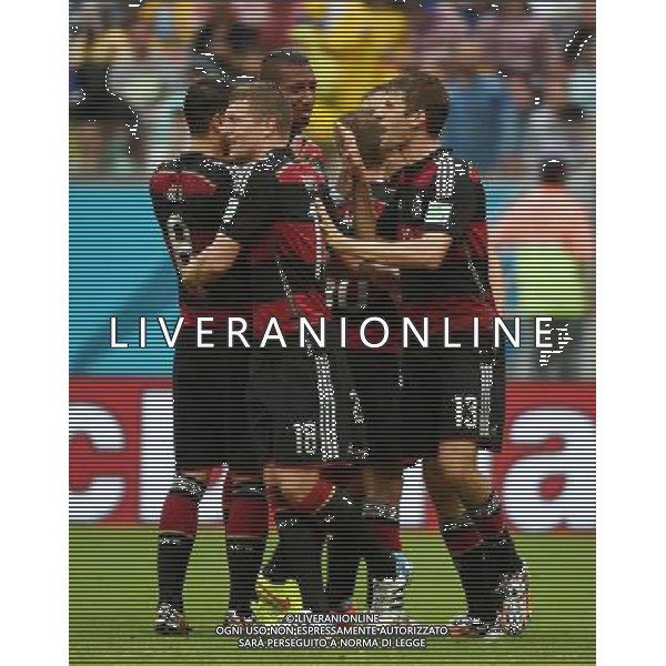 (140626) -- RECIFE, June 26, 2014 () -- Germany\'s Thomas Muller (1st R) celebrates for scoring a goal with his teammates during a Group G match between the U.S. and Germany of 2014 FIFA World Cup at the Arena Pernambuco Stadium in Recife, Brazil, on June 26, 2014.(/Guo Yong)(pcy) ©PHOTOHOT/Agenzia Aldo Liverani sas - ITALY ONLY - EDITORIAL USE ONLY