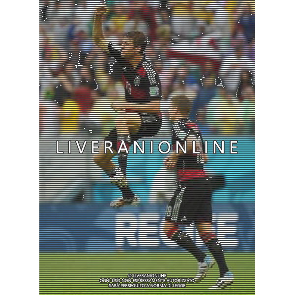 (140626) -- RECIFE, June 26, 2014 () -- Germany\'s Thomas Muller (L) celebrates for scoring a goal during a Group G match between the U.S. and Germany of 2014 FIFA World Cup at the Arena Pernambuco Stadium in Recife, Brazil, on June 26, 2014.(/Guo Yong)(pcy) ©PHOTOHOT/Agenzia Aldo Liverani sas - ITALY ONLY - EDITORIAL USE ONLY