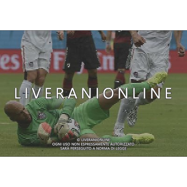 (140626) -- RECIFE, June 26, 2014 () -- Goalkeeper of the U.S. Tim Howard (bottom) holds the ball during a Group G match between the U.S. and Germany of 2014 FIFA World Cup at the Arena Pernambuco Stadium in Recife, Brazil, on June 26, 2014.(/Lui Siu Wai)(pcy) ©PHOTOHOT/Agenzia Aldo Liverani sas - ITALY ONLY - EDITORIAL USE ONLY