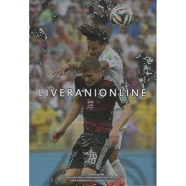 (140626) -- RECIFE, June 26, 2014 () -- Germany\'s Toni Kroos (front) competes for a header with Jermaine Jones of the U.S. during a Group G match between the U.S. and Germany of 2014 FIFA World Cup at the Arena Pernambuco Stadium in Recife, Brazil, on June 26, 2014.(/Lui Siu Wai)(pcy) ©PHOTOHOT/Agenzia Aldo Liverani sas - ITALY ONLY - EDITORIAL USE ONLY