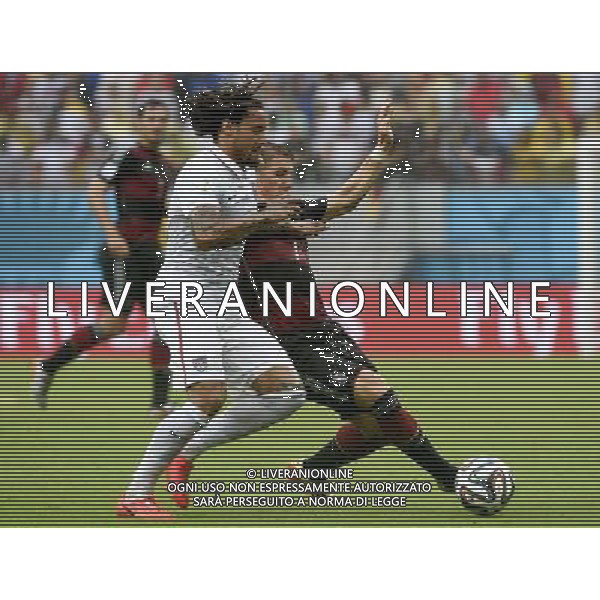 (140626) -- RECIFE, June 26, 2014 () -- Germany\'s Bastian Schweinsteiger (R, front) vies with Jermaine Jones (L, front) of the U.S. during a Group G match between the U.S. and Germany of 2014 FIFA World Cup at the Arena Pernambuco Stadium in Recife, Brazil, on June 26, 2014.(/Lui Siu Wai)(pcy) ©PHOTOHOT/Agenzia Aldo Liverani sas - ITALY ONLY - EDITORIAL USE ONLY