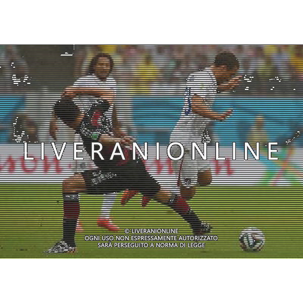 (140626) -- RECIFE, June 26, 2014 () -- Germany\'s Mats Hummels (L, front) vies with Fabian Johnson of the U.S. (R, front) during a Group G match between the U.S. and Germany of 2014 FIFA World Cup at the Arena Pernambuco Stadium in Recife, Brazil, on June 26, 2014.(/Guo Yong)(pcy) ©PHOTOHOT/Agenzia Aldo Liverani sas - ITALY ONLY - EDITORIAL USE ONLY
