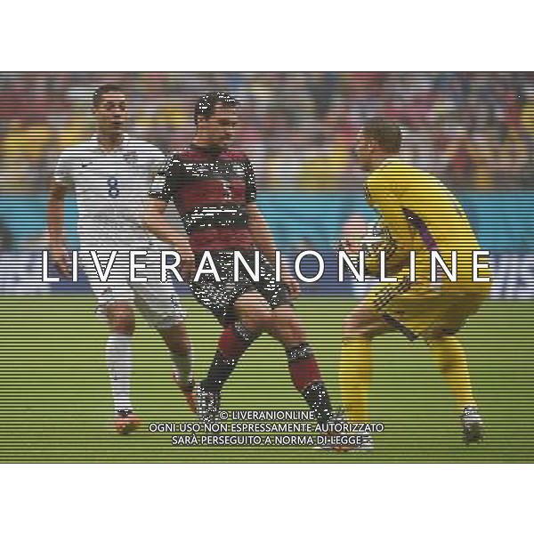 (140626) -- RECIFE, June 26, 2014 () -- Germany\'s goalkeeper Manuel Neuer (R) holds the ball during a Group G match between the U.S. and Germany of 2014 FIFA World Cup at the Arena Pernambuco Stadium in Recife, Brazil, on June 26, 2014.(/Guo Yong)(pcy) ©PHOTOHOT/Agenzia Aldo Liverani sas - ITALY ONLY - EDITORIAL USE ONLY